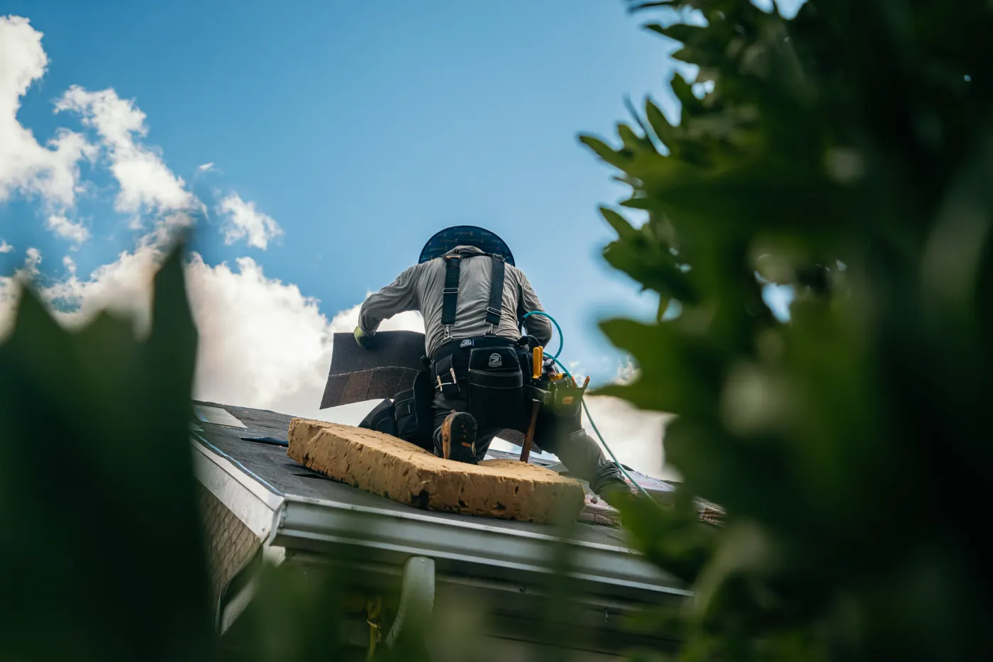 Tarping and dry-in on a Sunman commercial roof